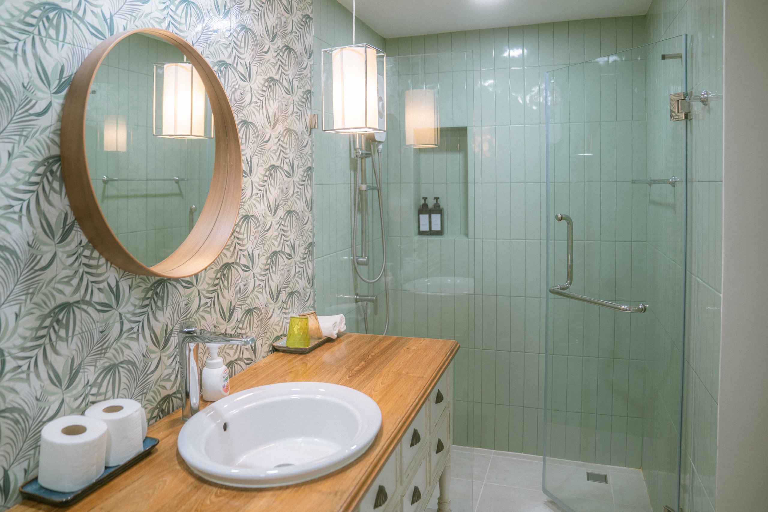 Bathroom with palm-print wall