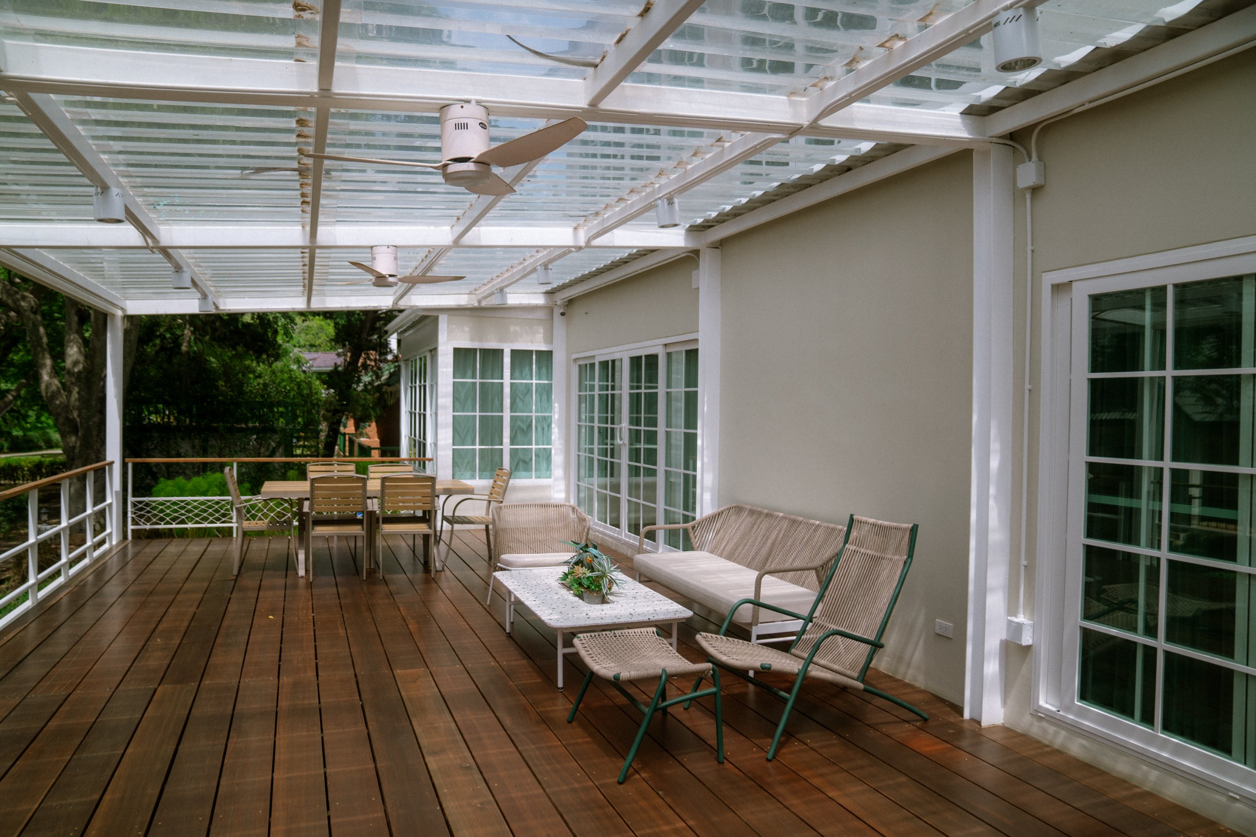 Covered terrace with dining and lounge seating